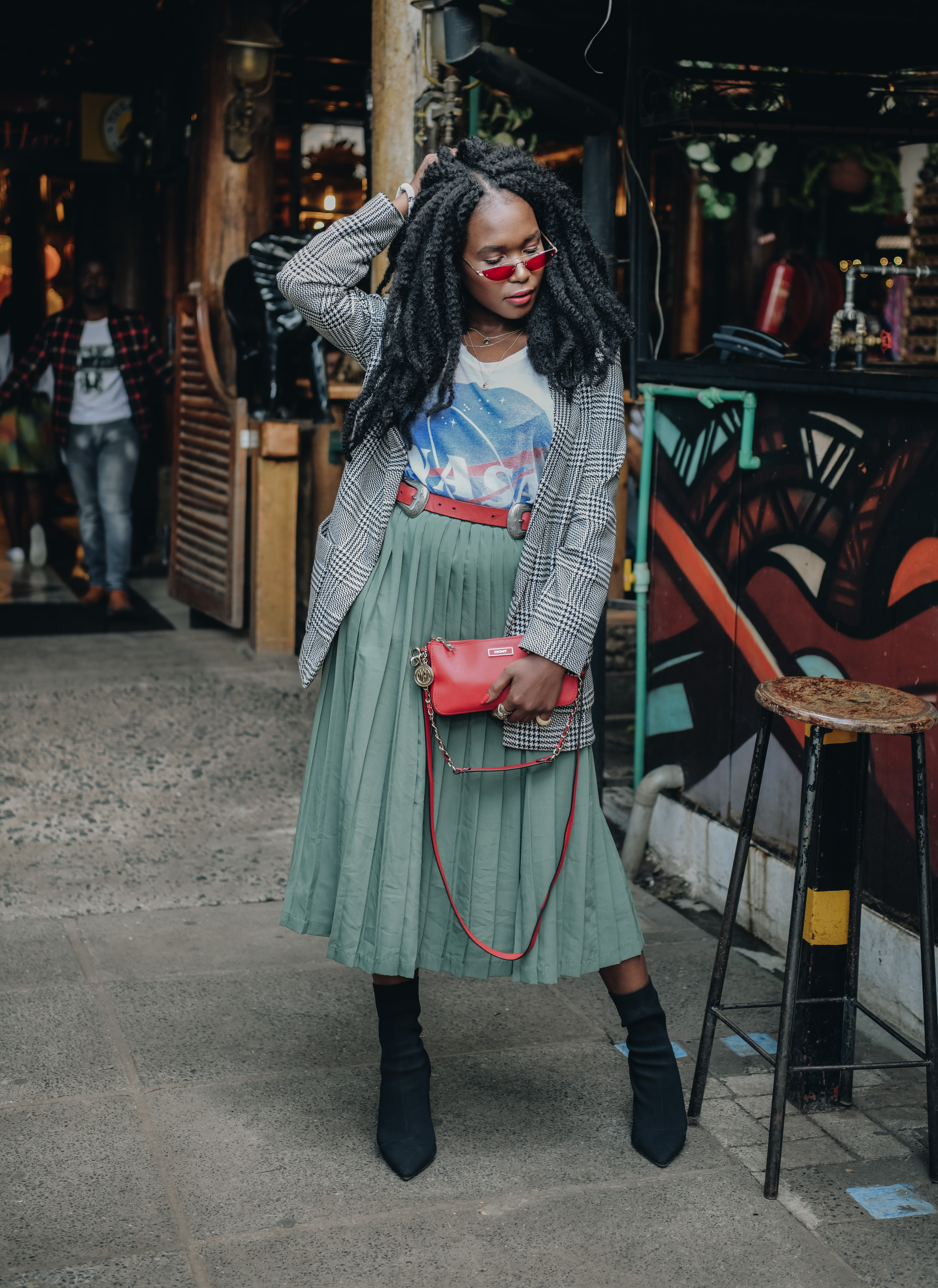 Kadenyi, Fashion blogger, black, african, model, natural hair, marley hair, red sunglasses green plaid skirt, NASA tshirt, black sock boots, plaid jacket. red bag, DKNY, Mango, red belt (1)