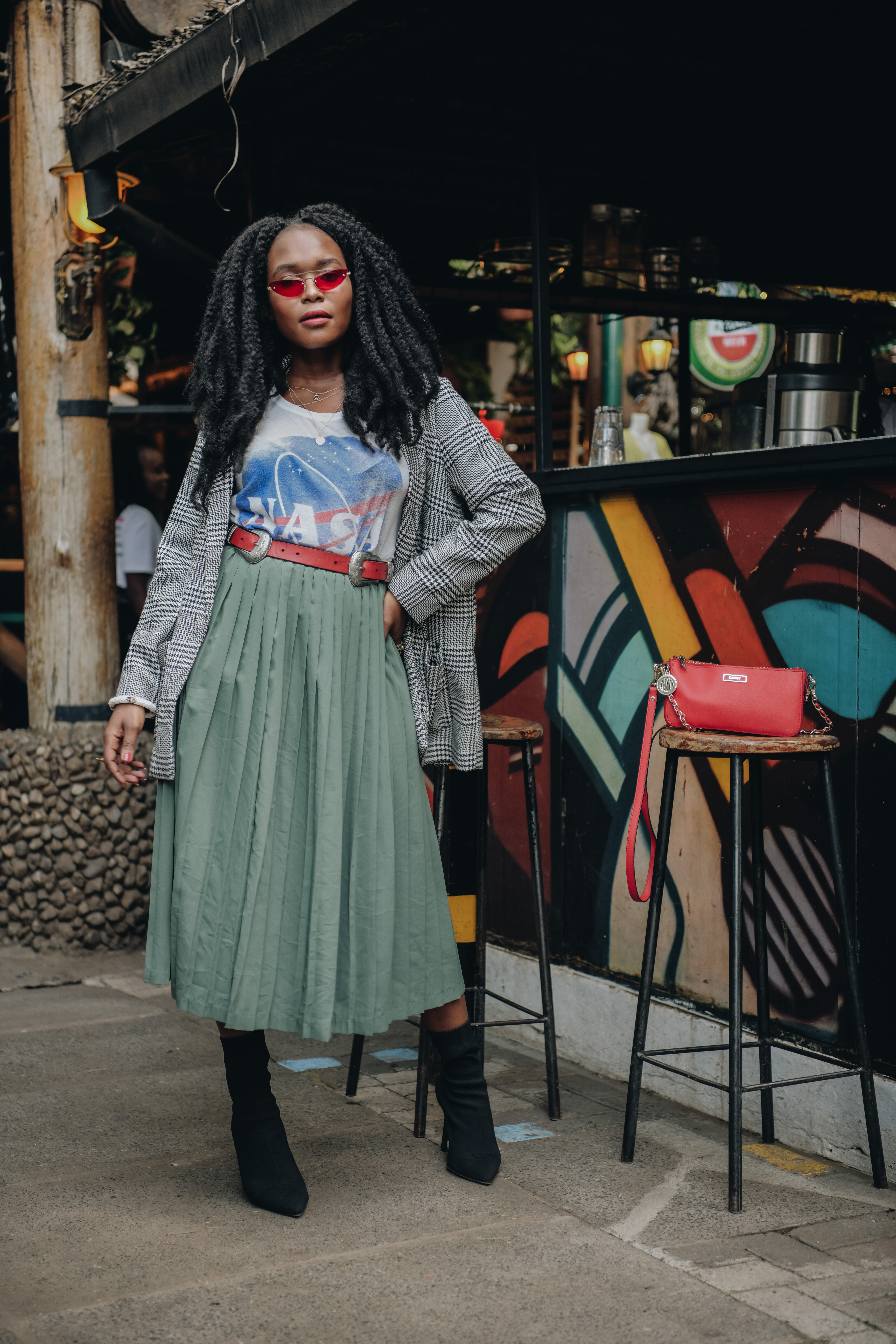 Kadenyi, Fashion blogger, black, african, model, natural hair, marley hair, red sunglasses green plaid skirt, NASA tshirt, black sock boots, plaid jacket. red bag, DKNY, Mango, red belt (4)