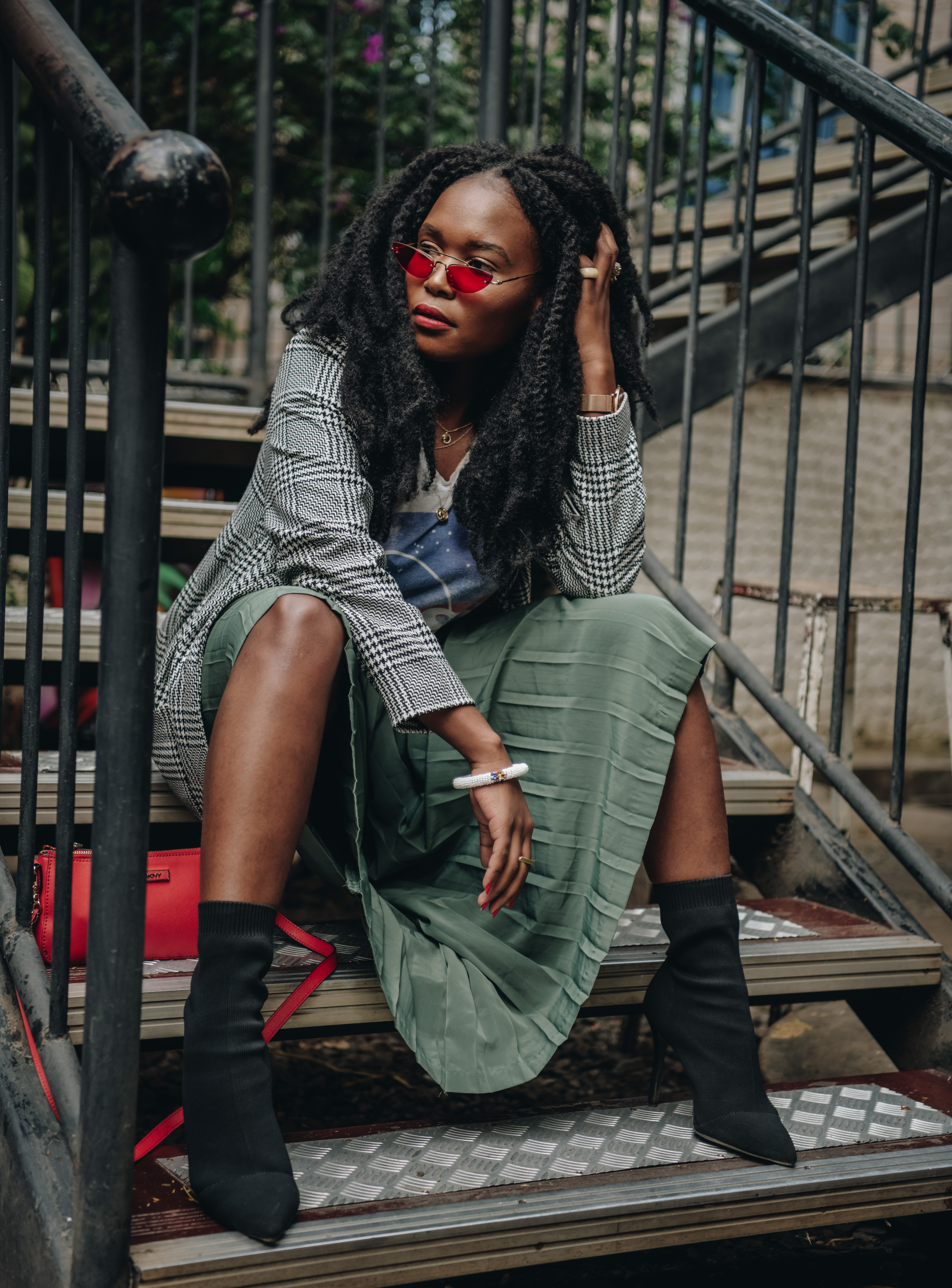 Kadenyi, Fashion blogger, black, african, model, natural hair, marley hair, red sunglasses green plaid skirt, NASA tshirt, black sock boots, plaid jacket. red bag, DKNY, Mango, red belt (6)